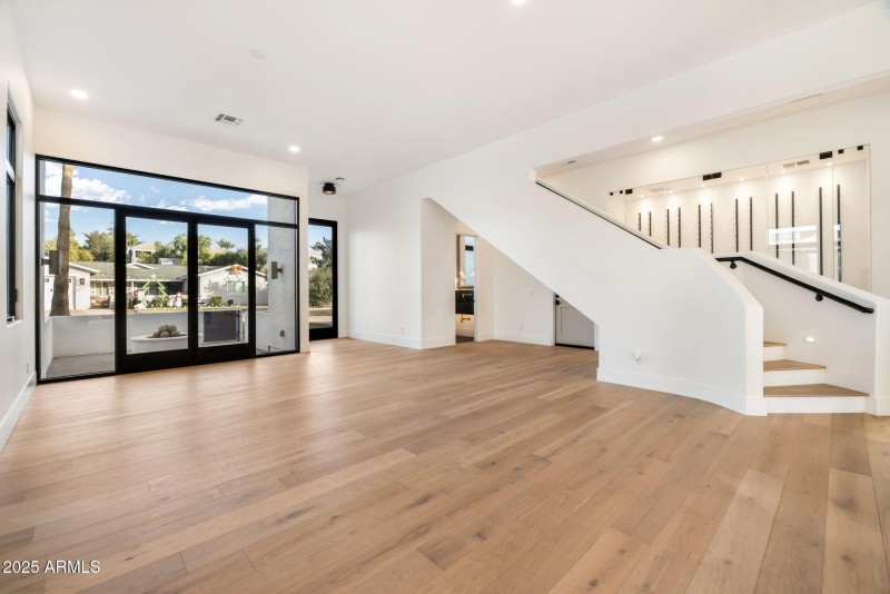 Living room and curved stairs