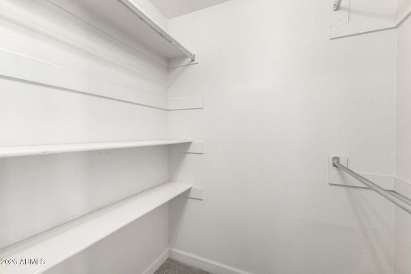 33 Primary Walk-in Closet