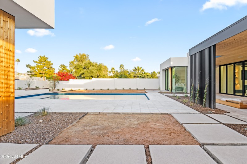 BACKYARD VIEW FROM OUTDOOR KITCHEN