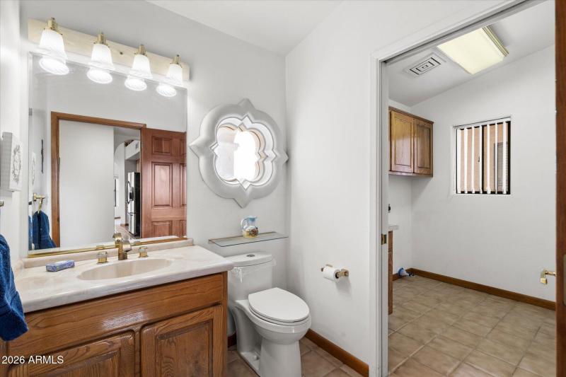 Powder room w attached laundry