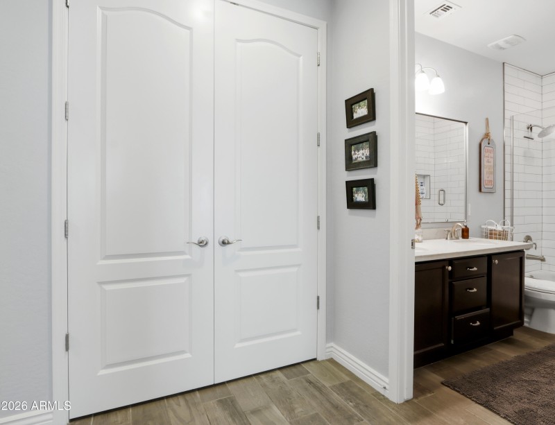 Double Door Storage Closet in Hall