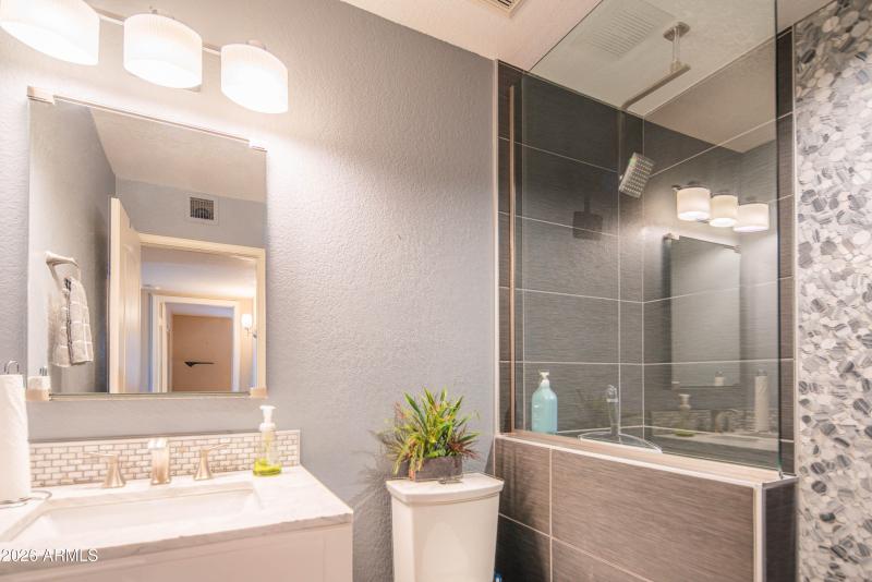 downstairs bathroom with walk-in shower