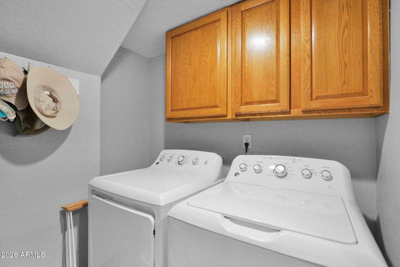 Downstairs laundry room W/D convey