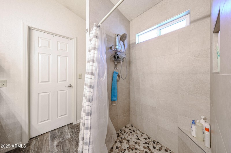 Shower with walkin closet behind