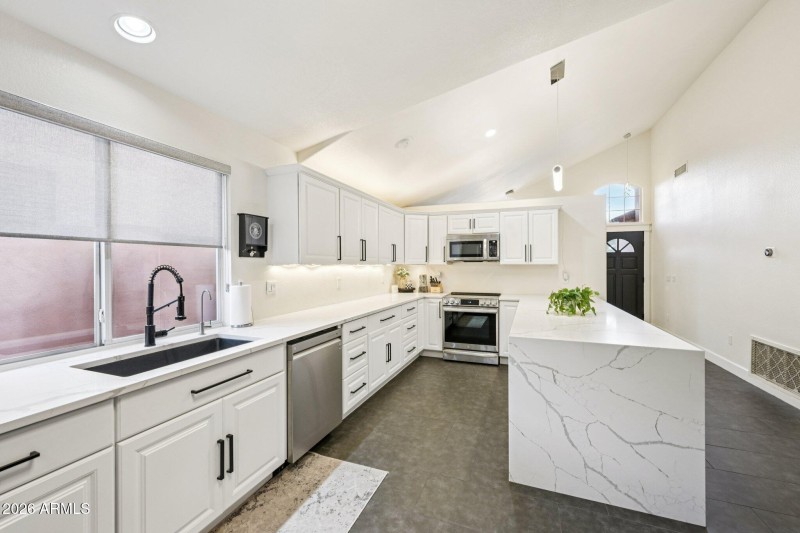Kitchen with Waterfall Countertops