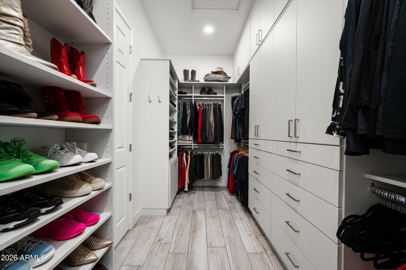 Primary Walk In Custom Closet