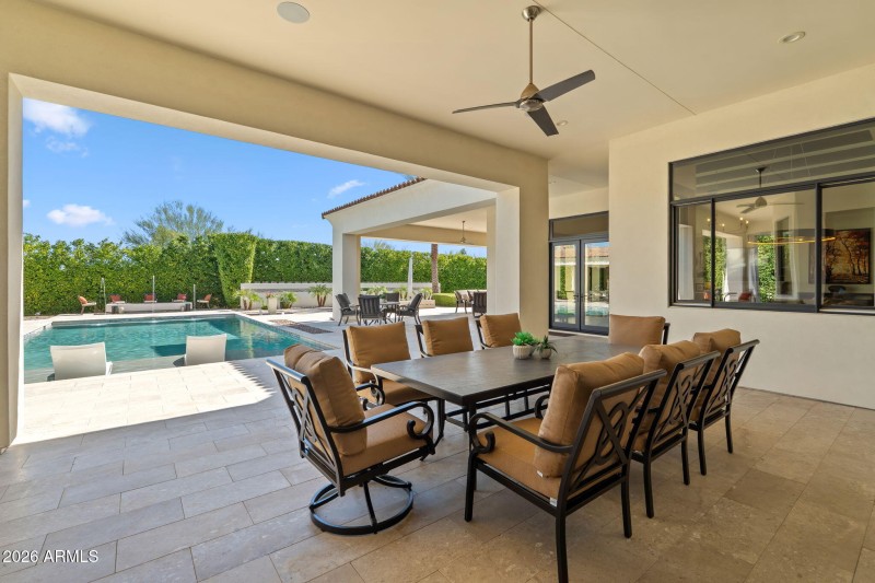 Huge Patio Surrounded by Lush Landscape