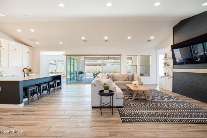 magnificent great room with vaulted ce