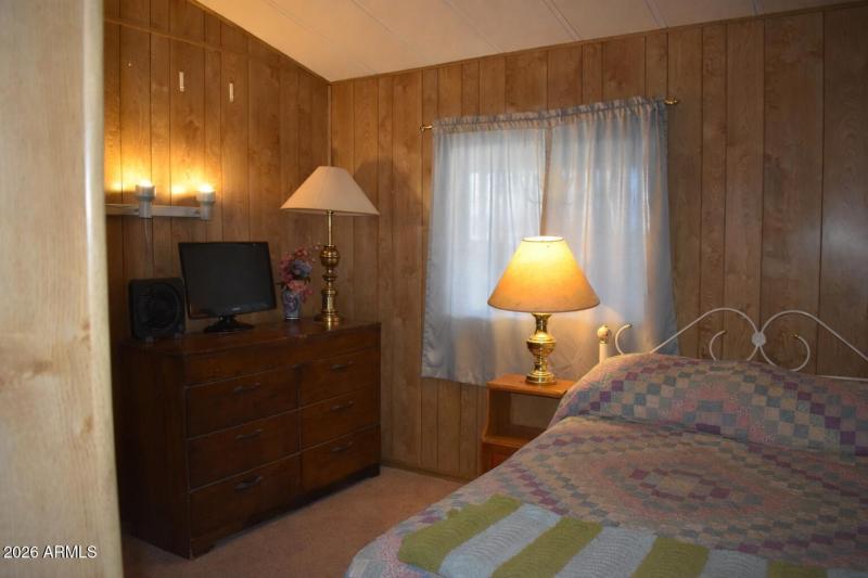 Cozy bedroom with warm wood accents