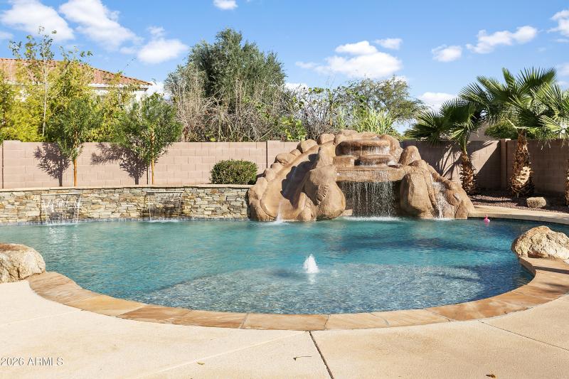 POOL W/ SLIDE, GROTTO, AND BAJA SHELF