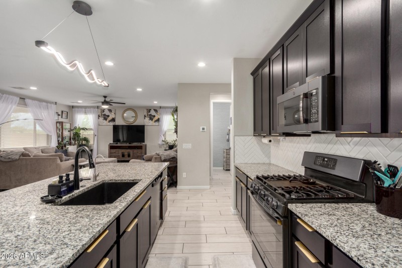 Gas Stove, Backsplash, Upgraded Lighting