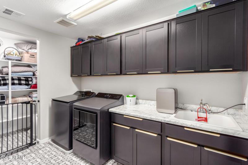 Laundry Room with Large Walk-in Closet