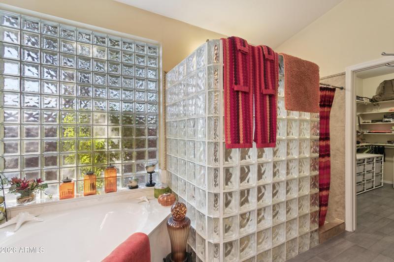 Primary bathroom tub and shower