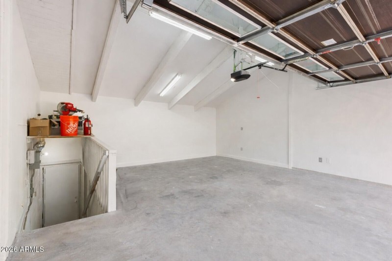 2 Car garage with stairwell too.