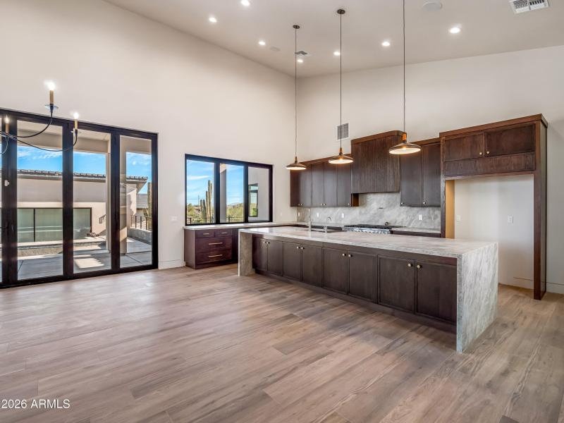 Kitchen with large quartzite island