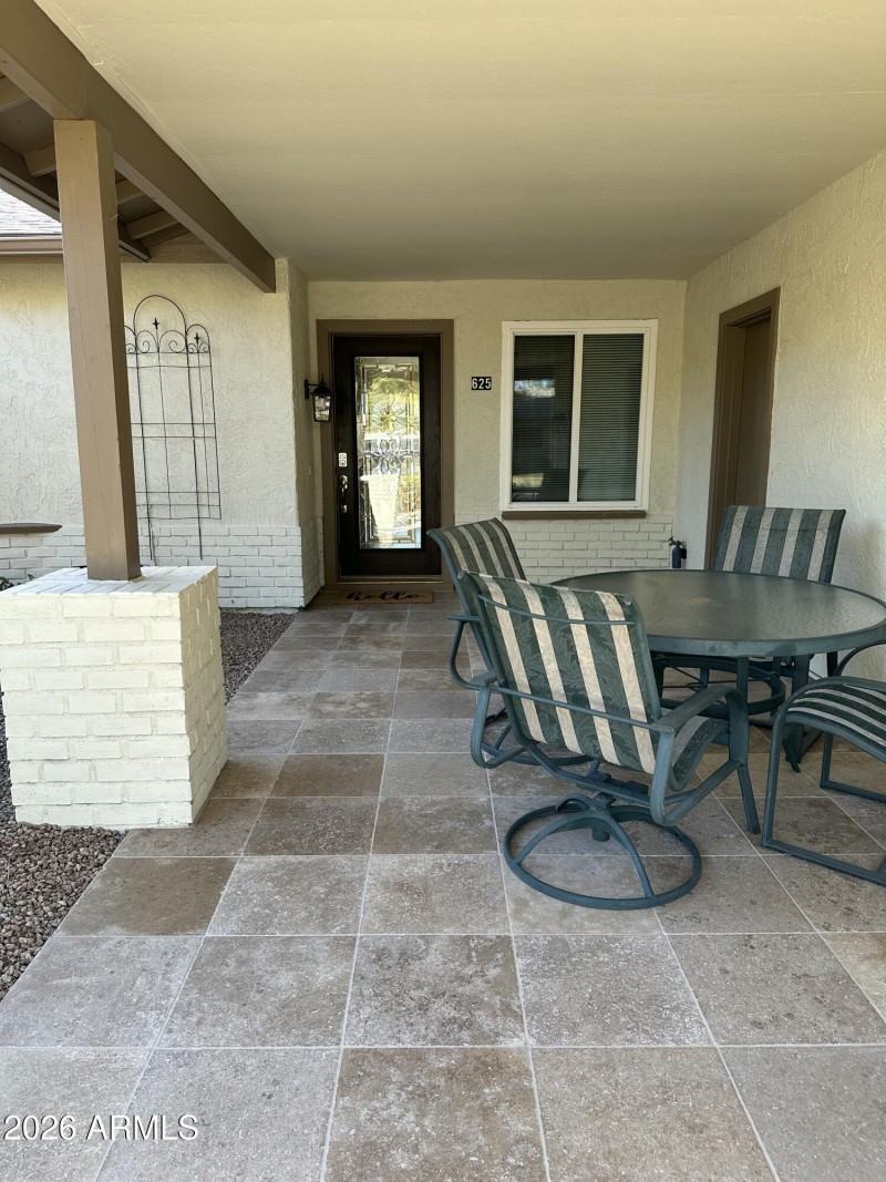 New travertine in front patio