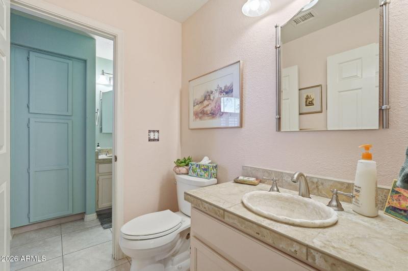 Second sink shared by hallway.