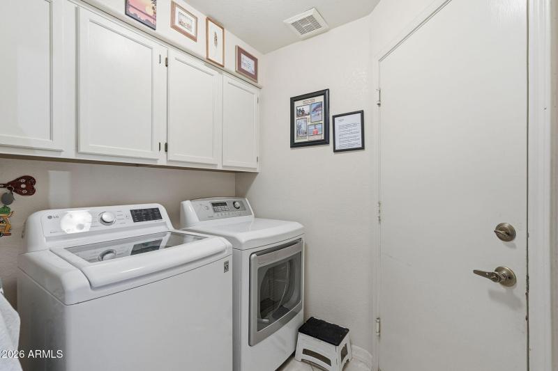 Laundry room & door to garage.