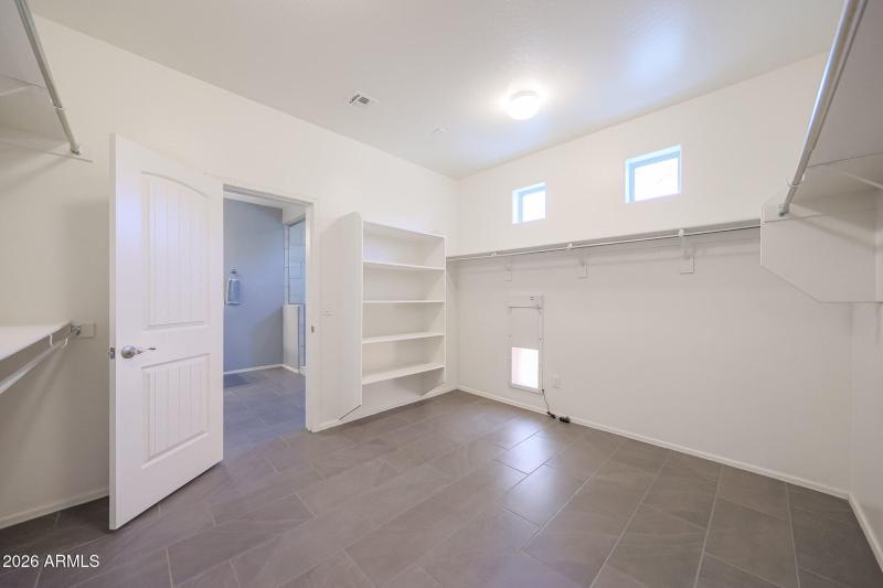 Spacious Primary Walk-in Closet