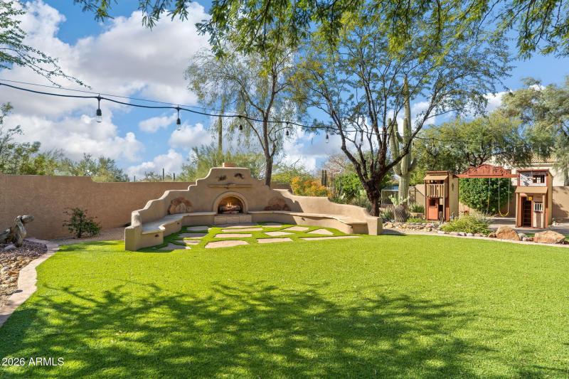 Outdoor fireplace gathering area