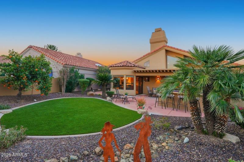 Faux grass and fruit trees