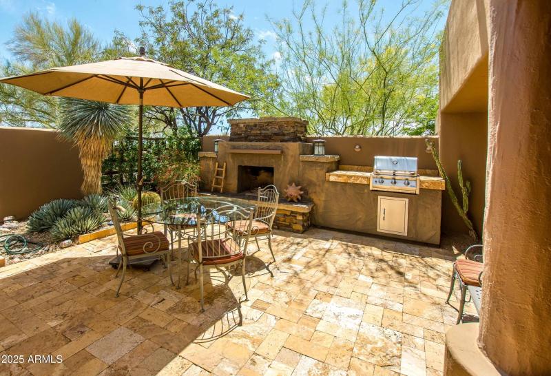 front patio with fireplace and bbq