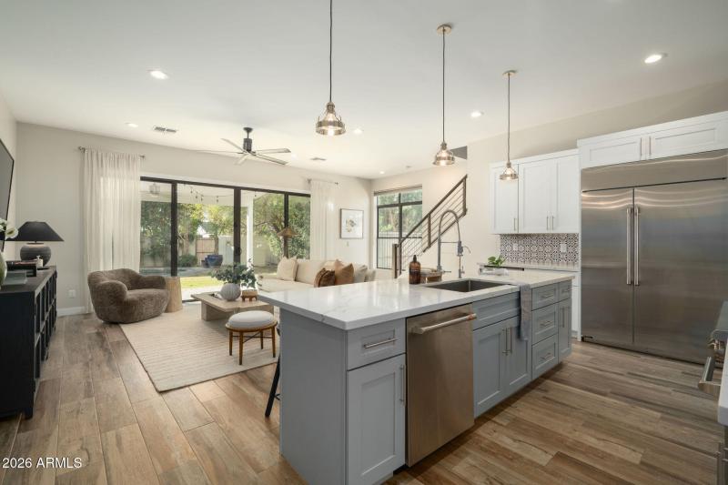 A large slider opens to the backyard