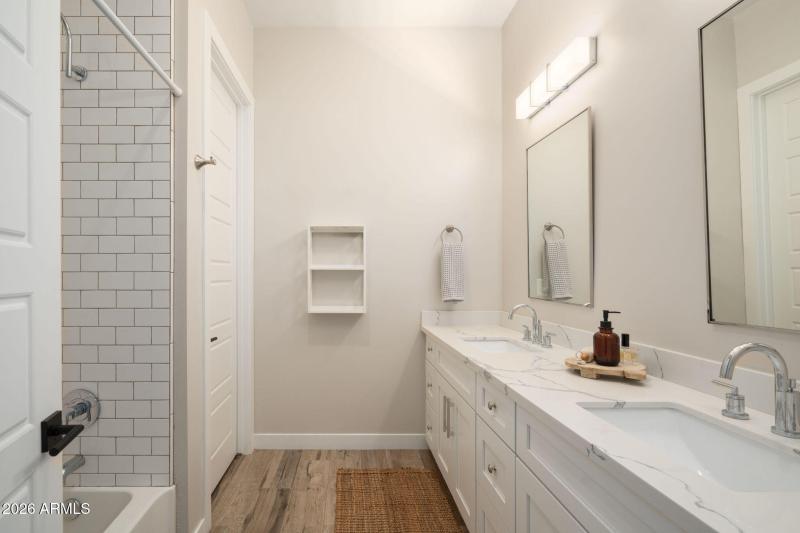 A secondary bath upstairs with tub