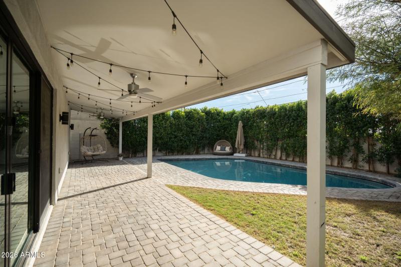 Great covered patio in the backyard