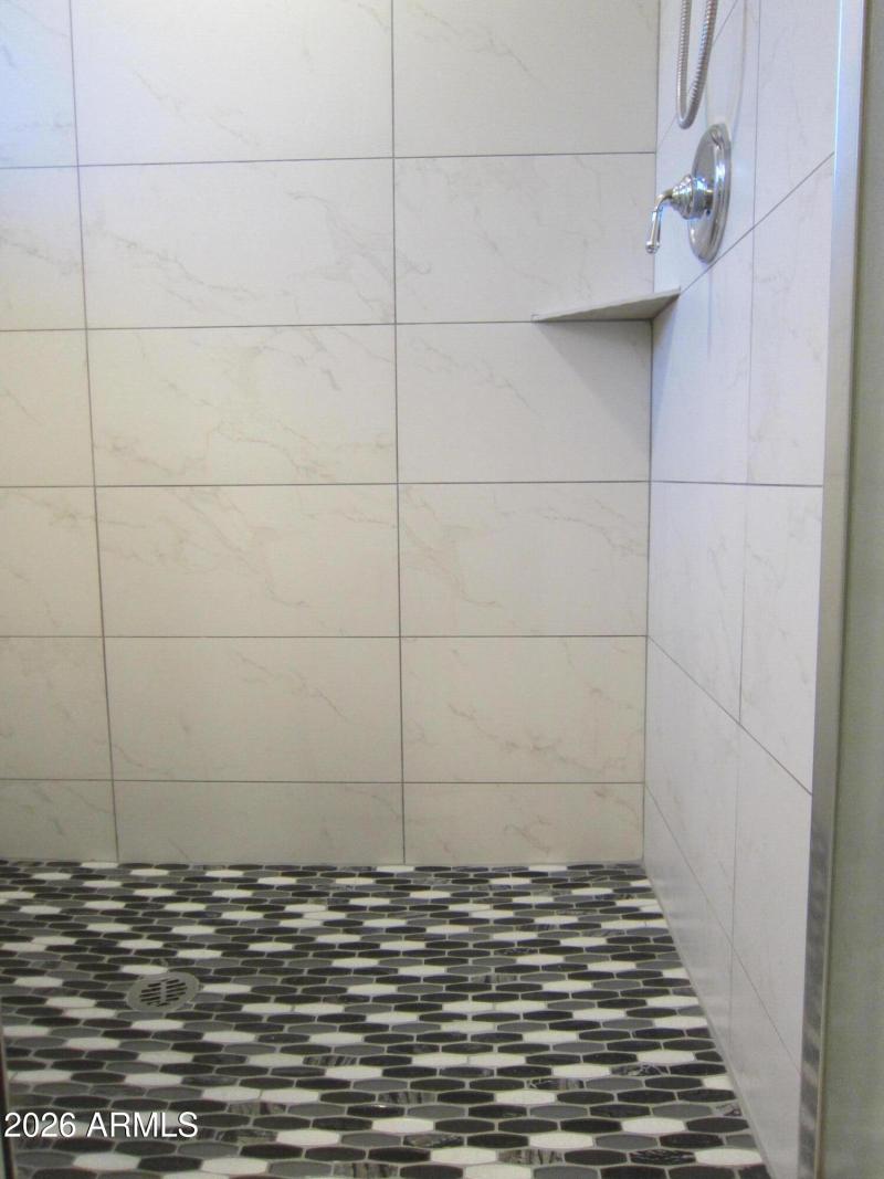 Primary Shower Tile Flooring