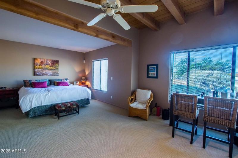 large master suite with runway views