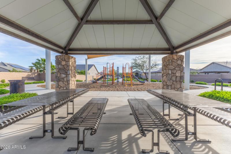 Community ramada with picnic tables