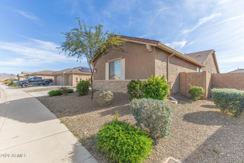Side yard with desert landscaping