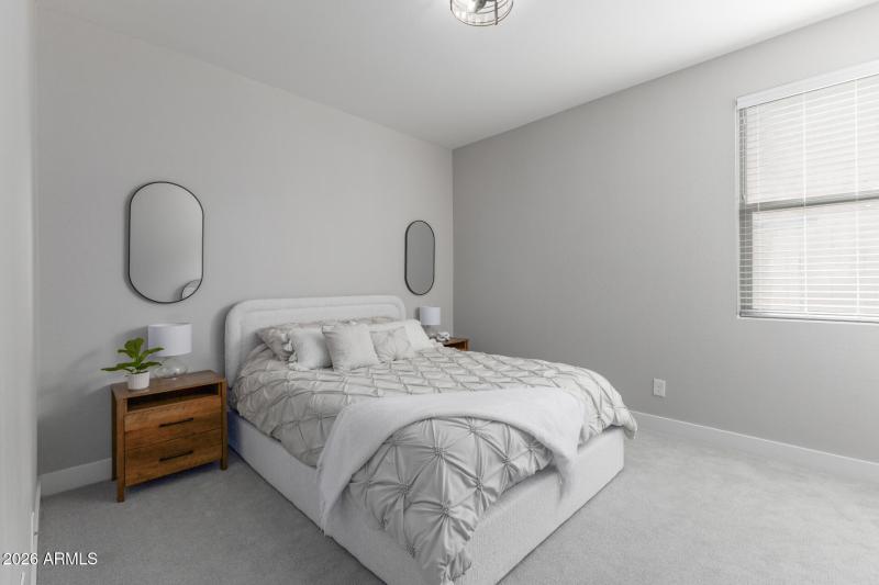 Third bedroom with neutral tones