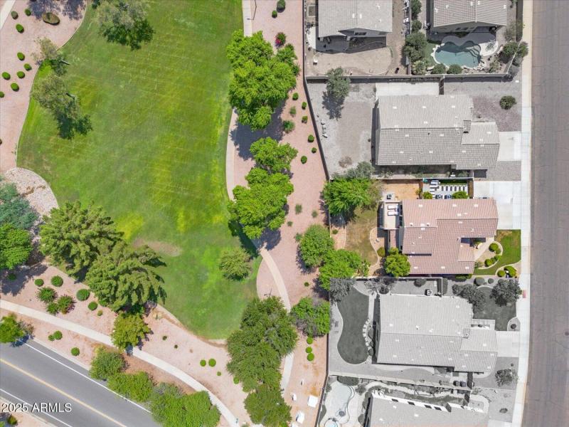 Lush greenbelt behind home