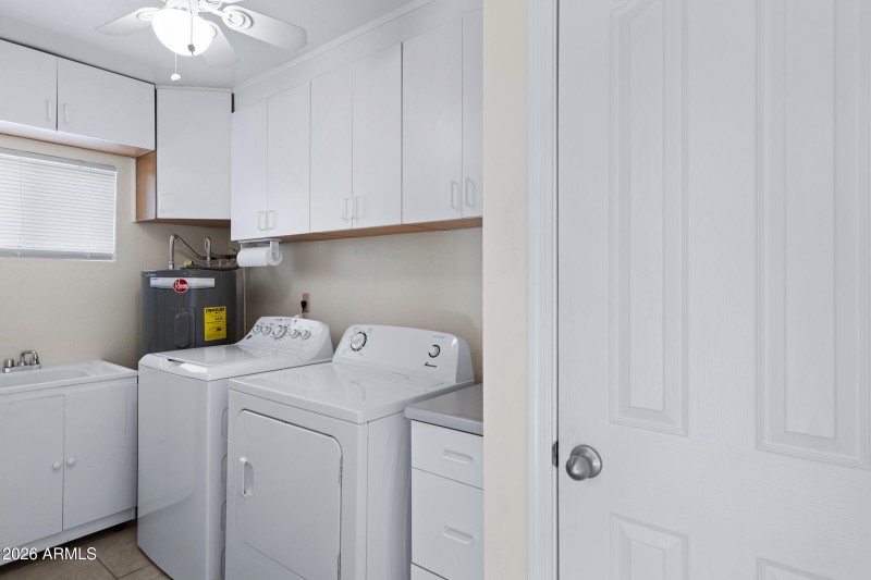 Laundry Room w/ Sink and Pantry Space