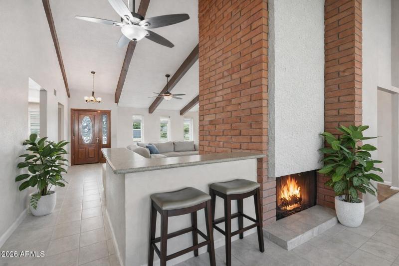 Coleen 16 W Wood bar with fire