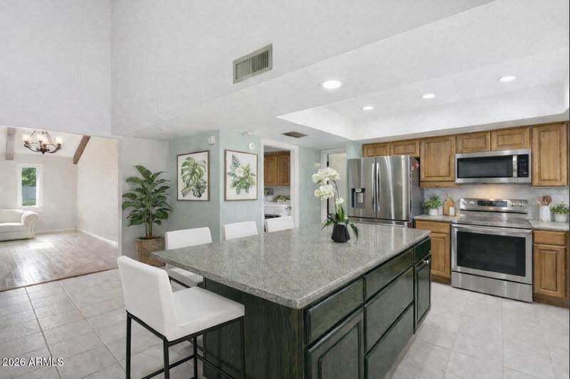 Coleen 16 W Wood Counter with plants and