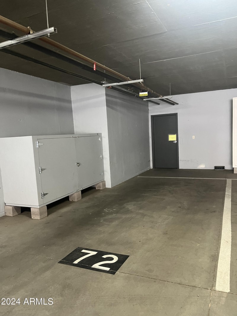 Extra wide parking space w/ storage