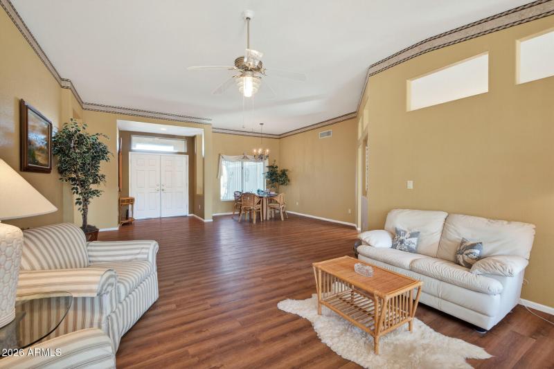 Living room toward entry & dining area