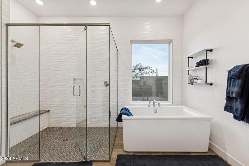 PRIMARY SUITE TUB AND SHOWER