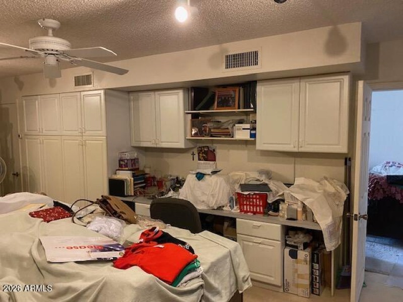 storage room has built in cabinets