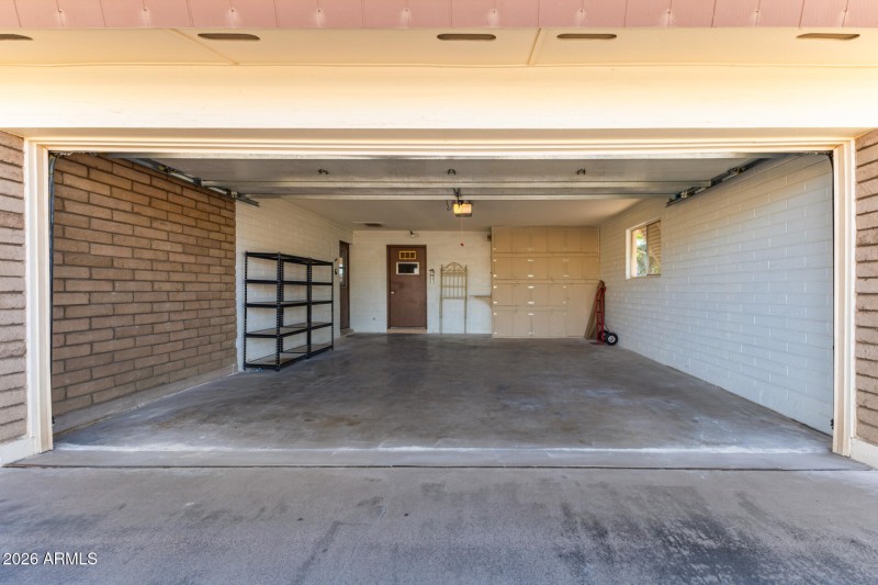 Spacious 2 car garage w cabinets