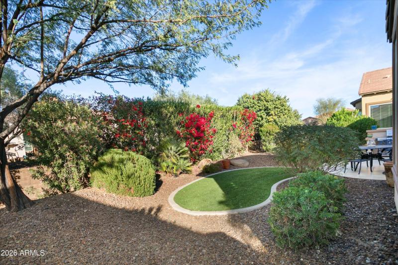 FAUX GRASS WITH PAVERS SUROUNDINGR