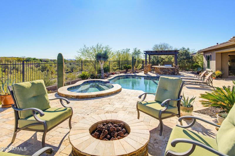 Firepit and pool with views