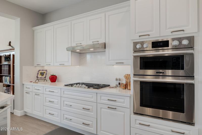 Upgraded cabinets, Quarts counters