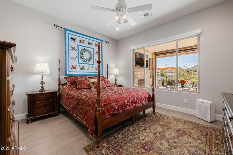 Primary bedroom w/remote shades