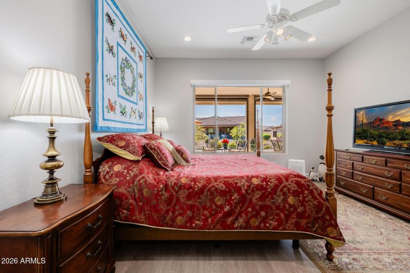 Primary bedroom w/remote shades