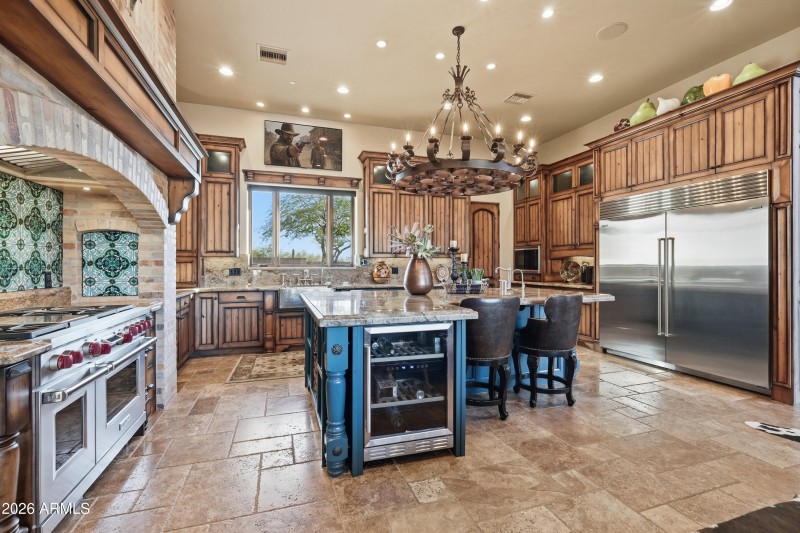 Island with prep sink, seating, storage