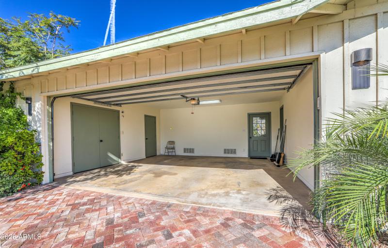 Two car garage with two storage rooms